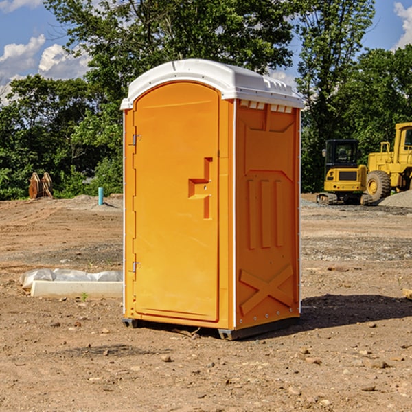 what is the cost difference between standard and deluxe portable toilet rentals in Orange County VT